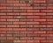 Seamless red brown brick wall pattern background texture. Red seamless brick wall background. Architectural seamless brick pattern