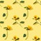Seamless regular pattern from beautiful sunflower on yellow paper. Natural autumn flowers