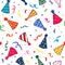 Seamless repeat pattern with colorful tossed birthday hats cones and confetti