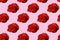 Seamless roses pattern on pink background