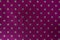 Seamless shiny polka dot wrapping paper. Violet foil for design of gift wrapping, wrapping paper, wallpaper. Stylish shiny texture