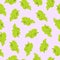 Seamless simple pattern. Bunch of green grapes. Light purple background.