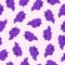 Seamless simple pattern. Bunch of purple grapes. Light purple background.