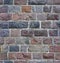 Seamless stone wall from a granite brick