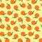 Seamless summer pattern with cartoonish orange fruit and leaves on yellowish orange background. simple vector texture