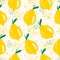 Seamless summer vector pattern with whole yellow lemons with leaves. Tropical background in hand drawn cartoon style