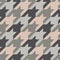 Seamless surface pattern with houndstooth ornament. Classic fashion fabric print. Checked geometric background.