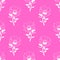 seamless symmetrical pattern of white graphic magnolia flowers on a pink background