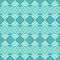 Seamless teal and green geometric wallpaper.