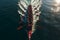 Seamless teamwork in an aerial view of synchronized rowing team