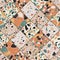 Seamless terrazzo pattern. Hand crafted and unique pattern repeating background. Granite textured shapes in vibrant colors