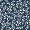 Seamless textile pattern. White leaves and flowers on a dark background. Scandinavian style for fabric, tile, paper. National