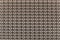 Seamless texture of brown plastic basket with abstract repeating wavy patterns background