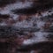 Seamless texture of burned and blood soaked denim