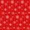 Seamless texture with festive garlands of snowflakes.
