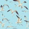 Seamless texture with a flock of seagulls flying