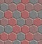 Seamless texture of hexagon concrete street tiles. 3D repeating pattern of red and gray honeycomb pavement stones