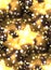 Seamless texture with a luxurious gold stars and bokeh.