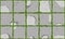 Seamless texture of old pavement with moss and concrete square cracked old bricks