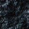 seamless texture pattern of black wool made of artificial fluffy sheep animal fur