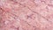 seamless texture of a slab of pink marble
