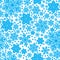 Seamless texture of snowflakes in vector design