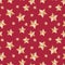 Seamless texture with stars festive on red background