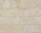 Seamless texture of travertine stone wall blocks