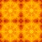 Seamless texture with warm orange red yellow kaleidoscope floral pattern