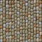 Seamless textured pattern of cobblestone paving of a park.