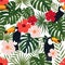 Seamless tropical pattern, monstera and palm leaves, bright chinese rose flowers, toucan birds on a white background.