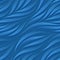 Seamless vector abstract pattern of blue graceful lines drawn with a pen. Flowing texture from smooth lines.