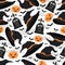 Seamless vector halloween pattern with witch hats, headstones, pumpkins and bats isolated on white background.  Illustration for