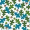 Seamless vector pattern with autumn leaves in seasonal colors. Oak leaf and acorn on white background - Vector