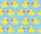 Seamless vector pattern with cute bright yellow ducks. Duck toy