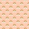 Seamless vector pattern of hand drawn doodle rainbow of warm autumn pastel color palette white clouds on peachy pink background