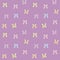 Seamless vector pattern with light colored pastel colored bows on a purple background