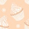 Seamless vector pattern in pastel colores. Cupcakes with pink whipped cream and confectionery sprinkles