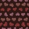 Seamless vector pattern with rows of hearts with swirls on them