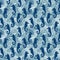 Seamless vector pattern with seahorses on textured blue background