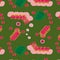 Seamless vector pattern with a set of cartoon worms on a green floral background.