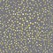 Seamless vector pattern of various yellow spots on a gray background