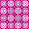 Seamless violet pattern with flowers in the circles.