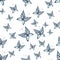 Seamless watercolor background consisting of blue moths, butterflies