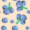 Seamless watercolor hand painted blueberries pattern on pale orange colored background.