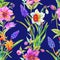 Seamless watercolor pattern on a blue background of spring flowers: daffodils, hellebore, muscari.