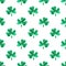 Seamless watercolor pattern with clover leaves on