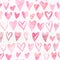 Seamless watercolor pattern with colorful hearts - romantic light and soft tints of pink and red.