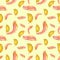 Seamless watercolor pattern with yellow and pink feathers of bird on light yellow background. Vintage style. Great nature pattern