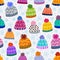 Seamless winter pattern with caps and snowflakes